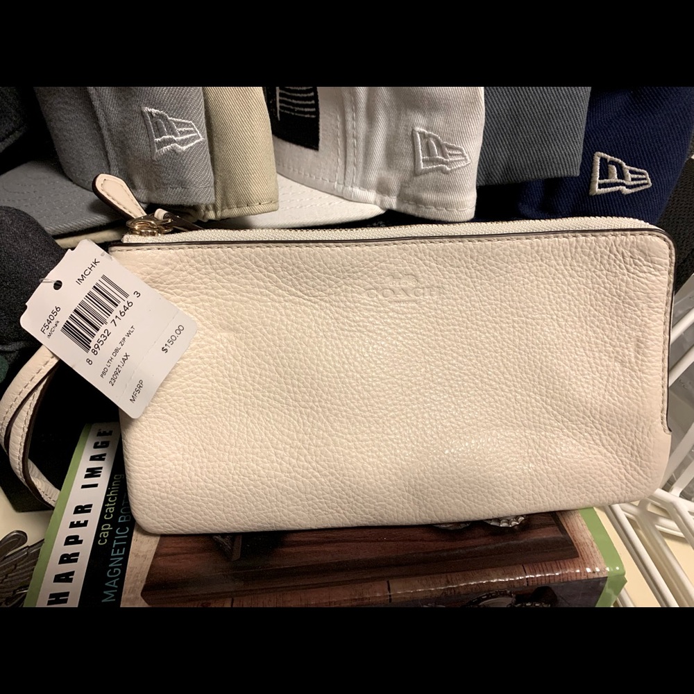 Coach Wristlet in Off White color